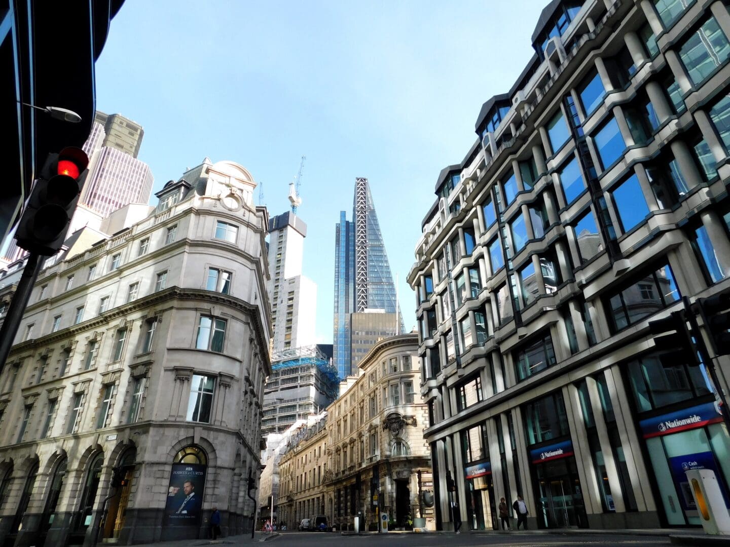 low-angle-view-buildings-city-against-sky