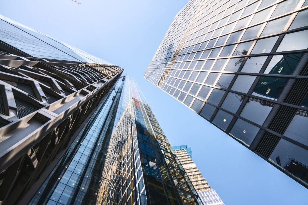 low-angle-view-modern-buildings-against-clear-sky-1-2