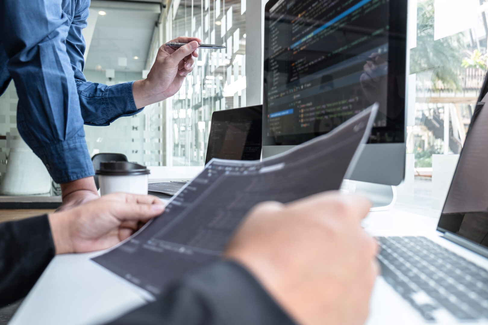 professional-team-of-programmer-working-on-project-in-software-d